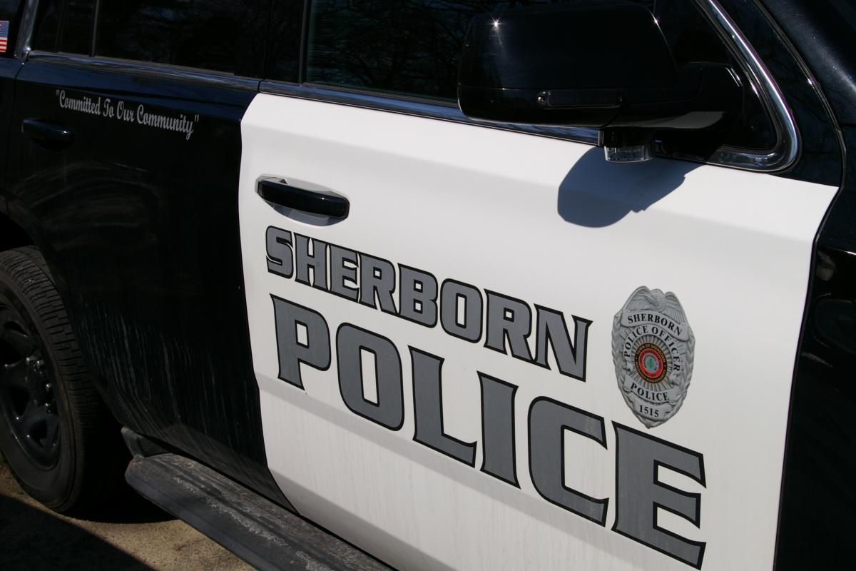 The side of a Sherborn Police cruiser