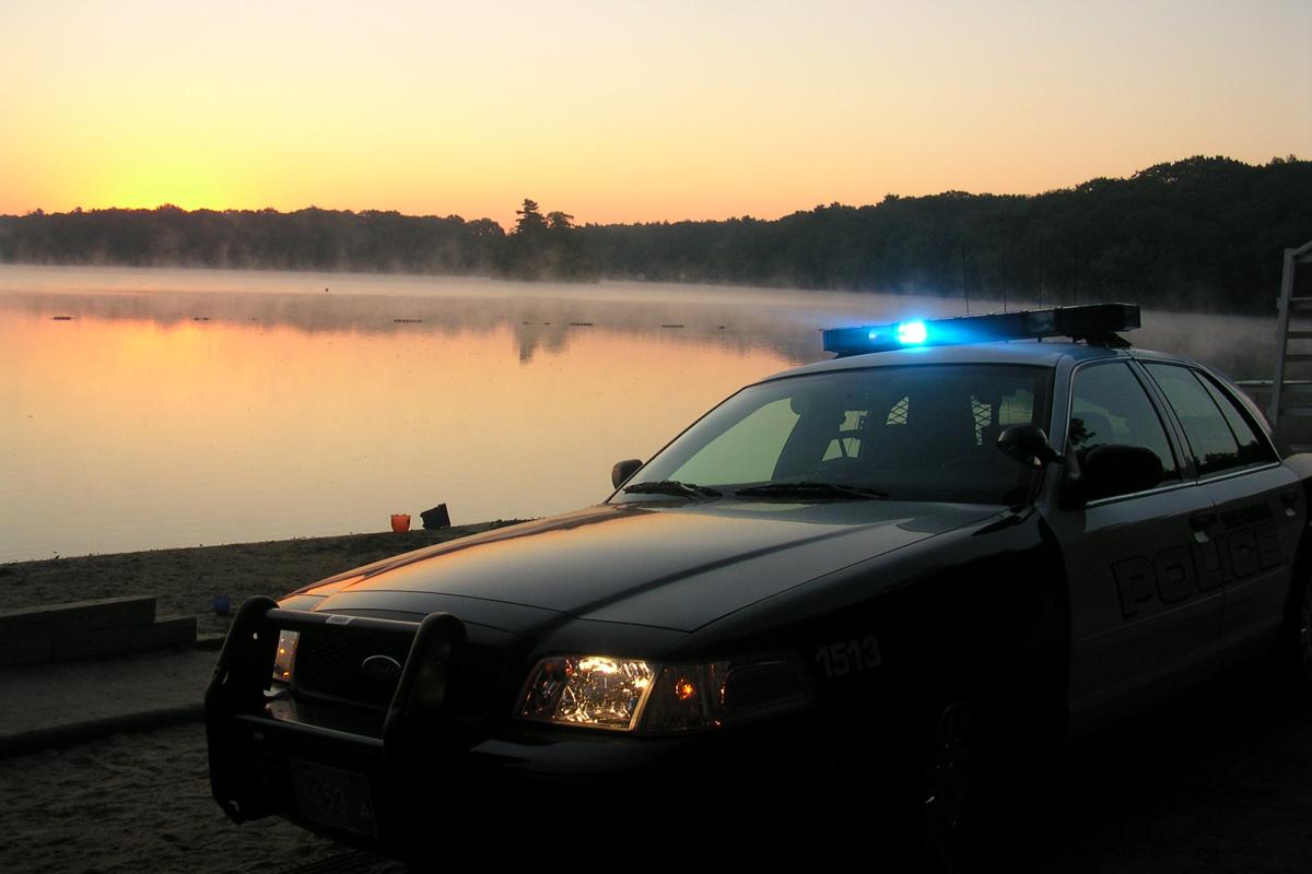 A police cruiser at dusk