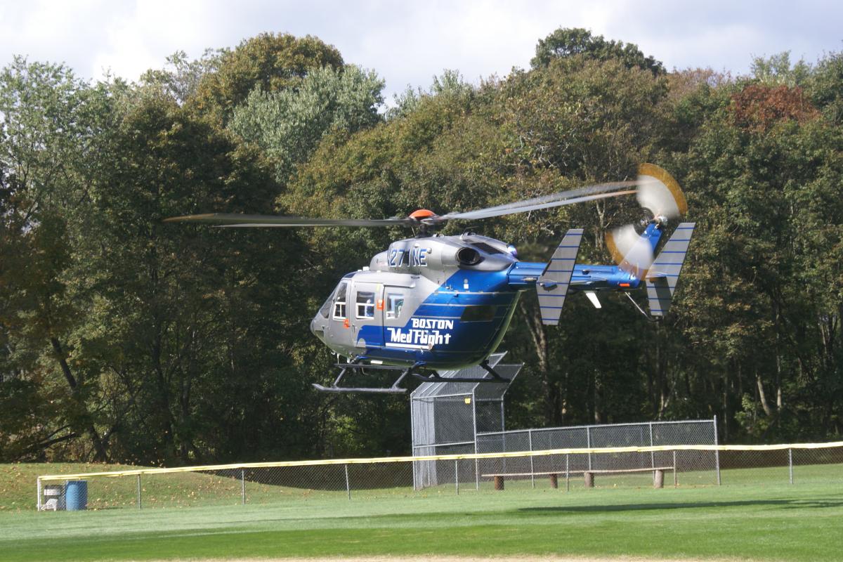 Helicopter above a field