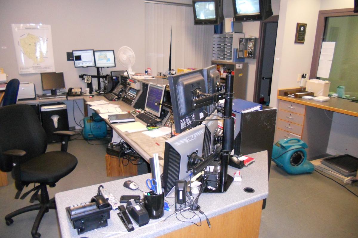 Work station with computer monitors and other equipment